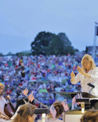 Elizabeth Schulze conducting the MSO at the annual Salute to Independence at the Antietam Battlefield.